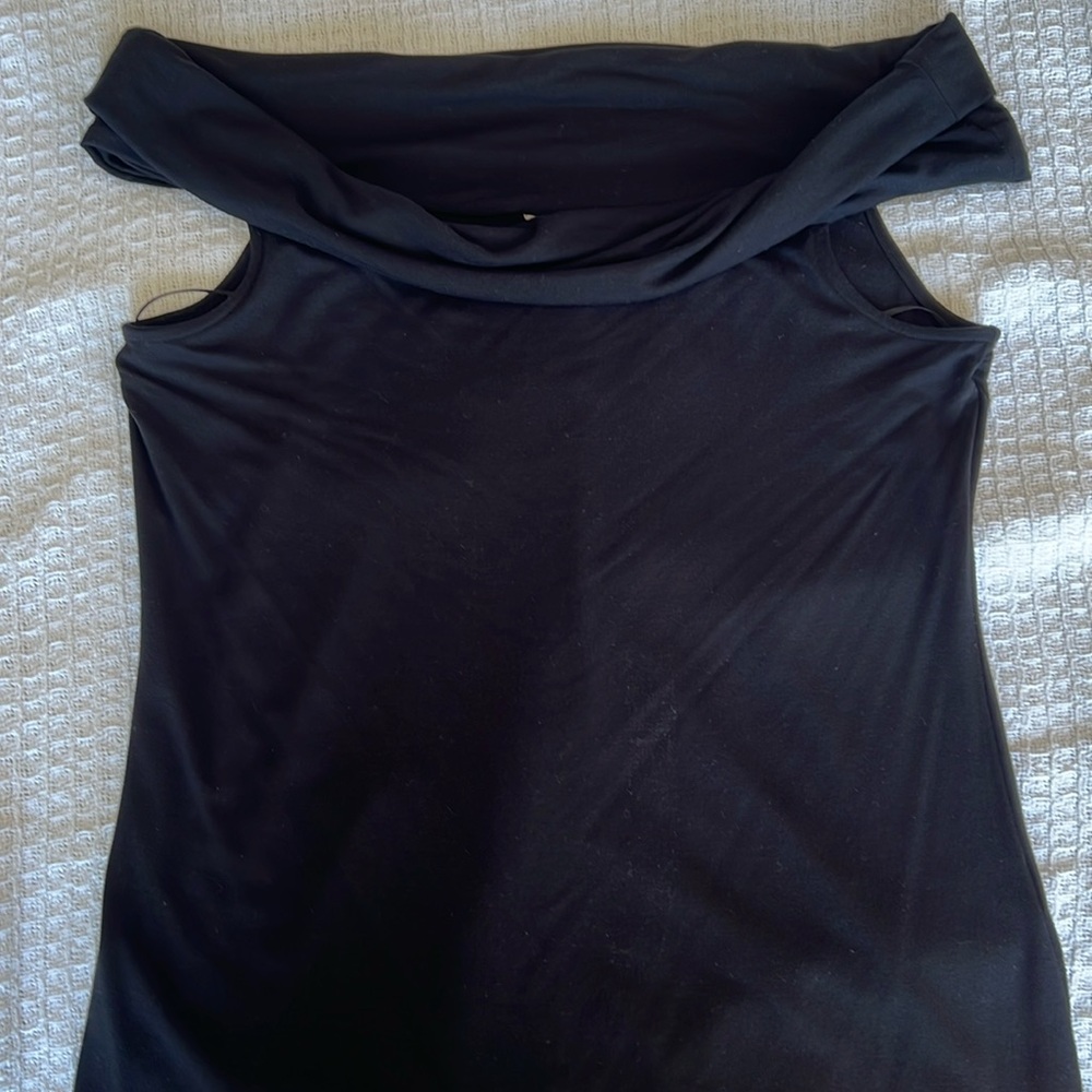Off the shoulder top on black.  Size L